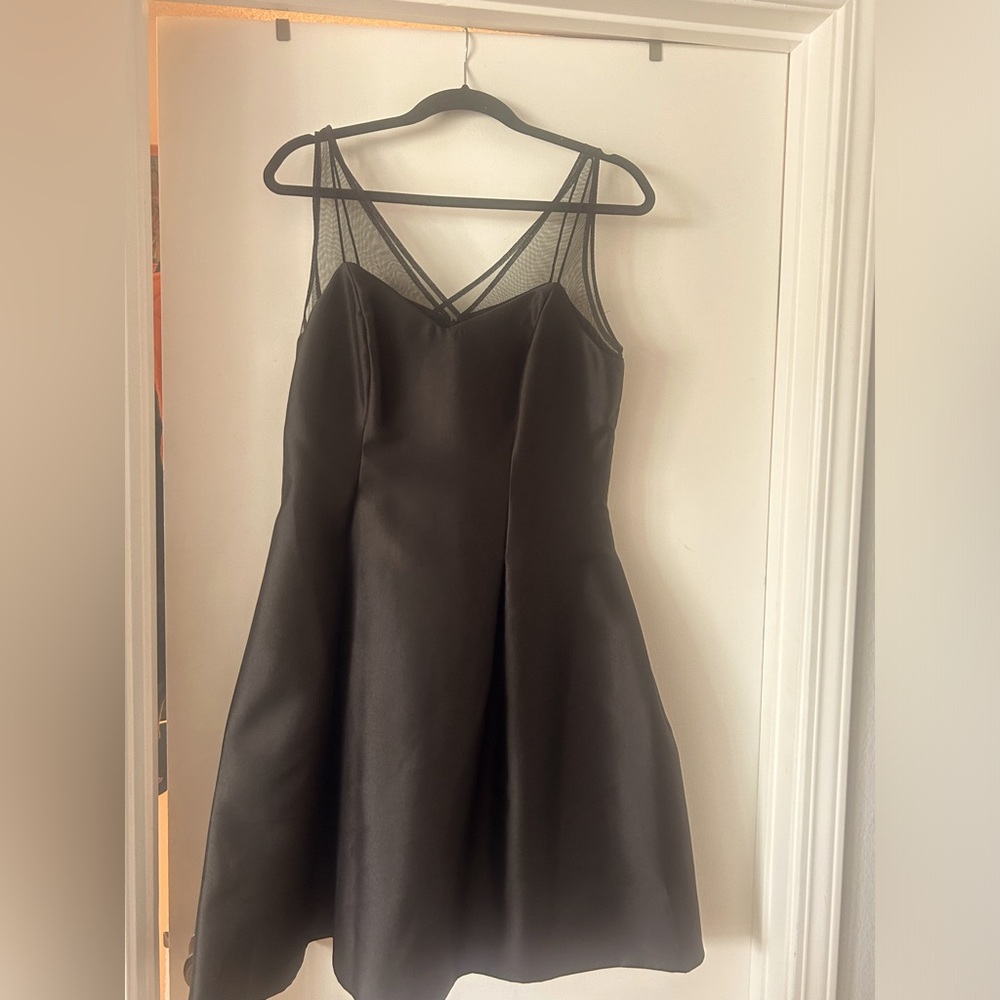 Lovely A line chic evening dress above the knee.